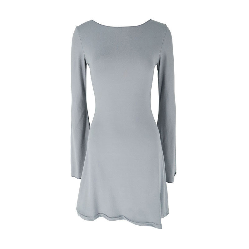 Damer elegant långärmad klänning med asymmetrisk fåll och flytande snitt Mirla-Eva Jonsson