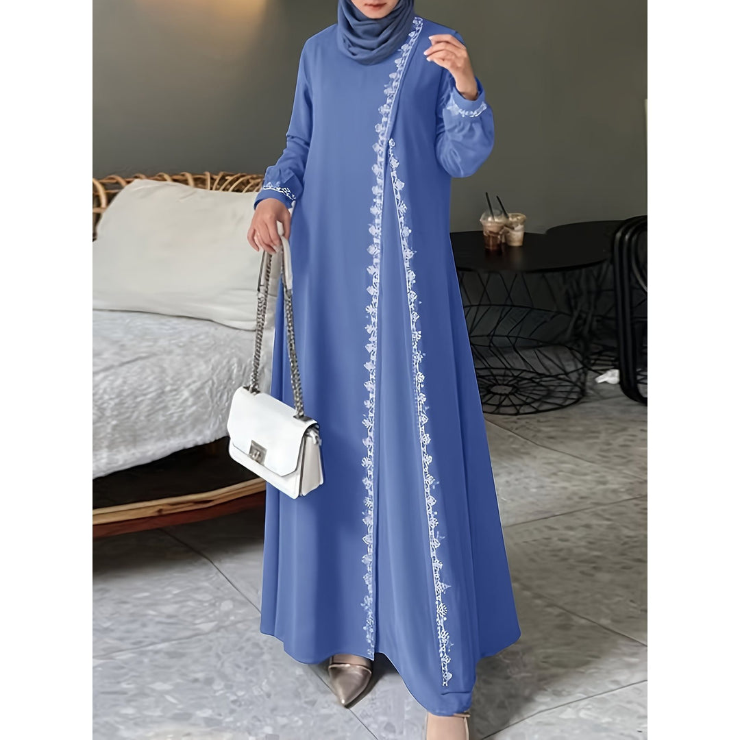 Damer elegant långärmad maxiklänning med broderidetaljer Mirla-Eva Jonsson
