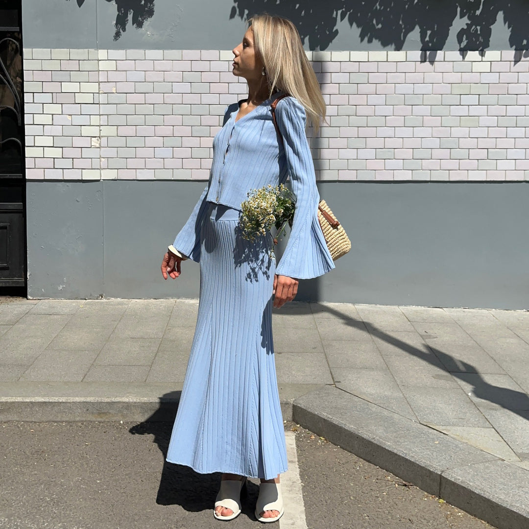Damer elegant långärmad maxiklänning med strukturerad ribbdesign Mirla-Eva Jonsson
