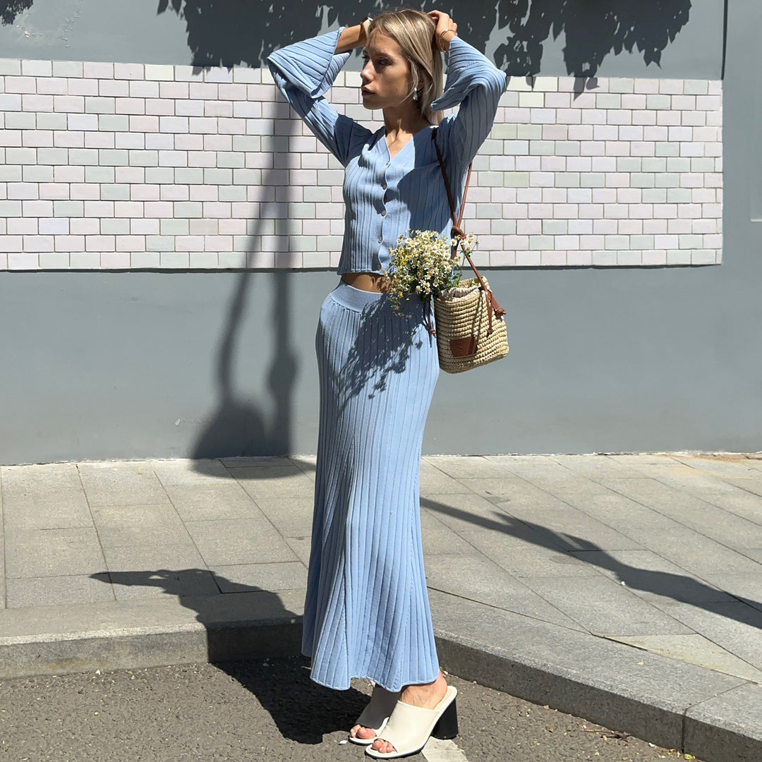 Damer elegant långärmad maxiklänning med strukturerad ribbdesign Mirla-Eva Jonsson