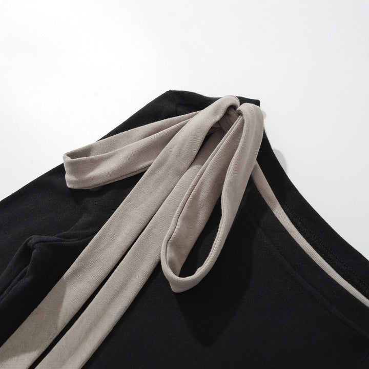 Damer elegant långärmad topp med fashionabla sladd- detaljer Mirla-Eva Jonsson