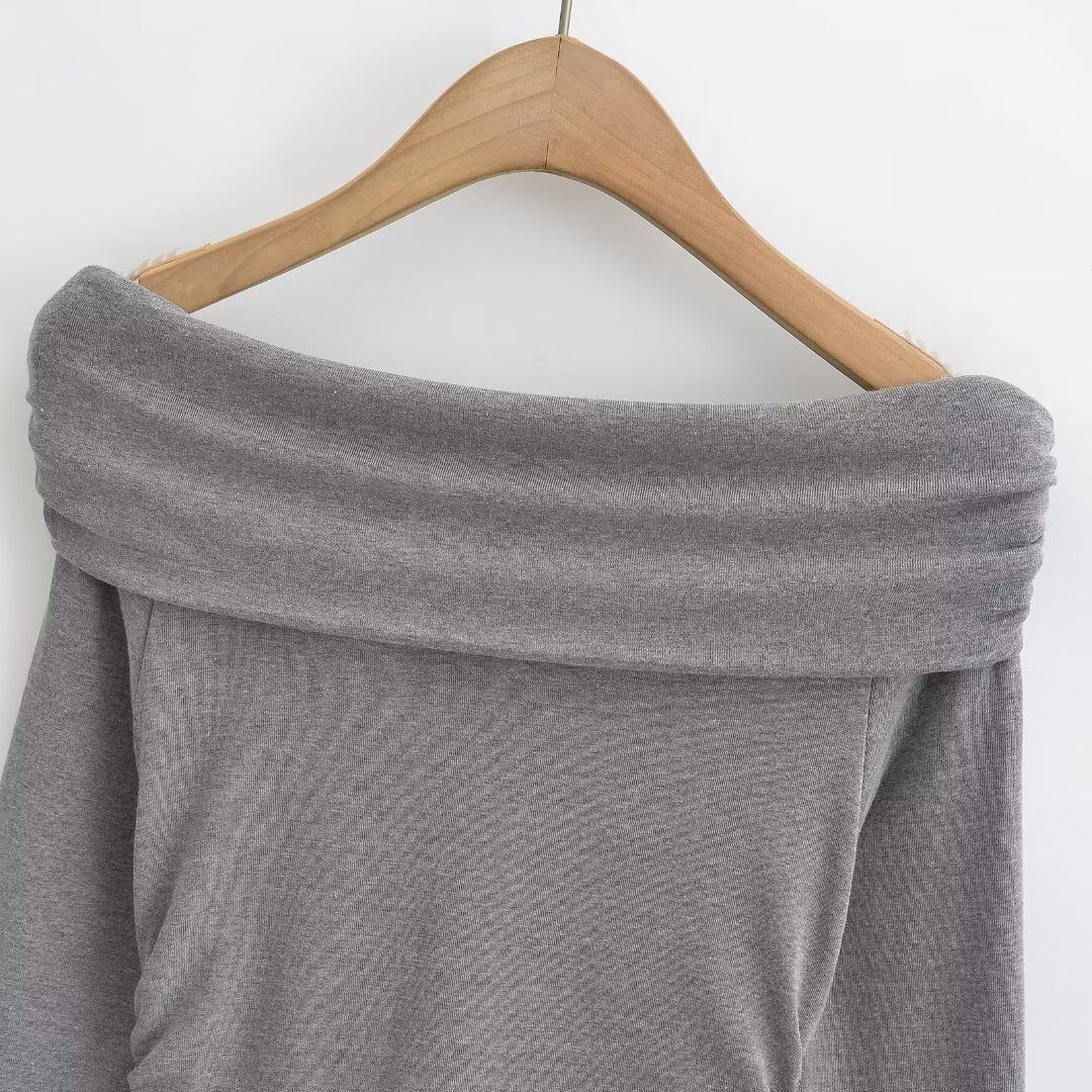 Damer elegant långärmad topp med off-shoulder design och raffinerad volangdetalj Mirla-Eva Jonsson