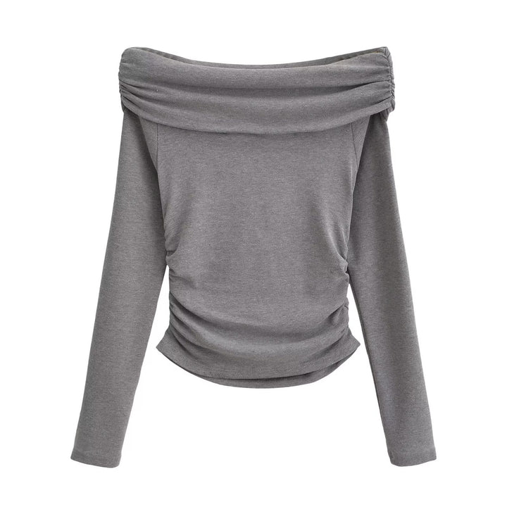 Damer elegant långärmad topp med off-shoulder design och raffinerad volangdetalj Mirla-Eva Jonsson