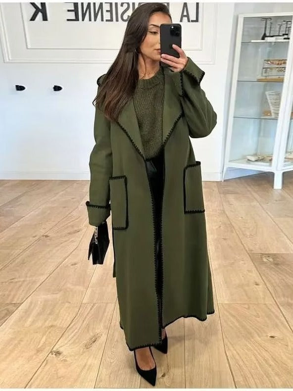 Damer elegant långkappa med bindebälte och kontrasterande passpoaler Mirla-Eva Jonsson