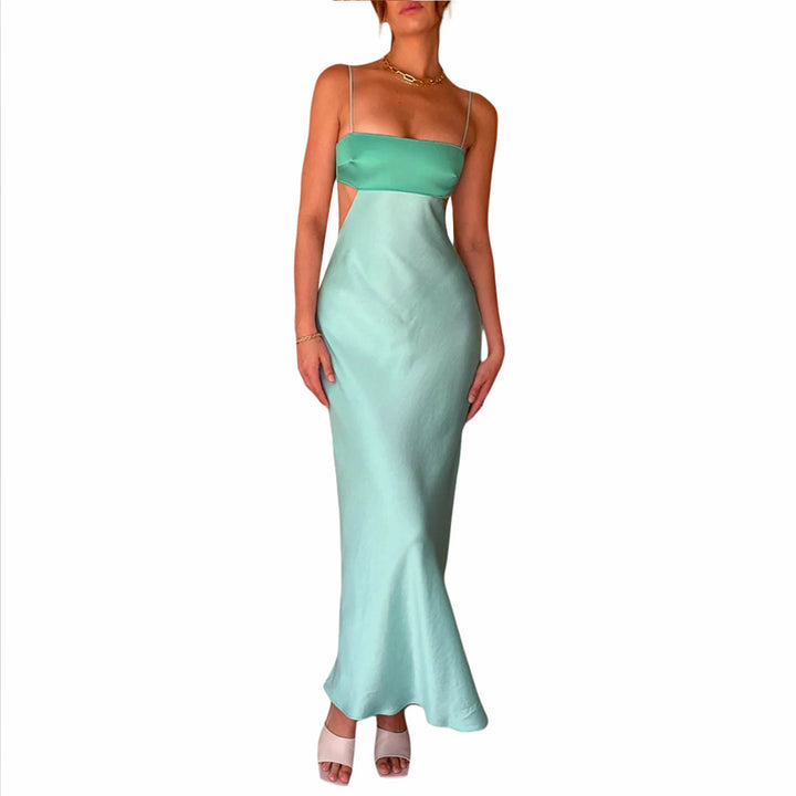 Damer elegant långt klänning med innovativ cut-out design och ömtåliga spaghettiband Mirla-Eva Jonsson