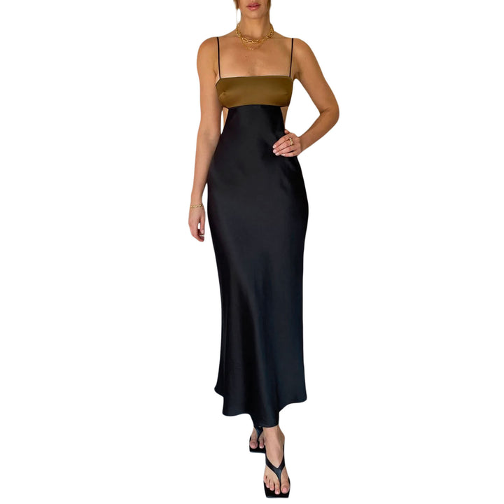 Damer elegant långt klänning med innovativ cut-out design och ömtåliga spaghettiband Mirla-Eva Jonsson
