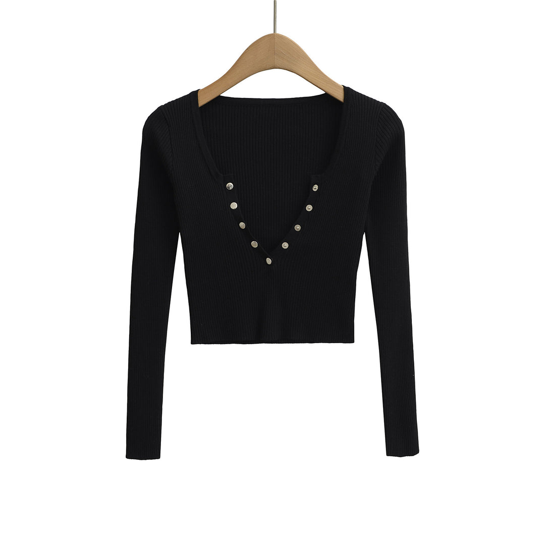 Damer elegant longsleeve med raffinerad V-hals och dekorativa knappar Mirla-Eva Jonsson