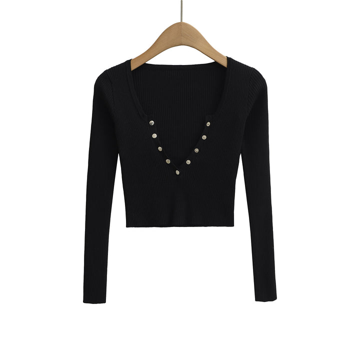 Damer elegant longsleeve med raffinerad V-hals och dekorativa knappar Mirla-Eva Jonsson