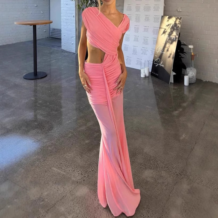 Damer elegant maxiklänning med asymmetrisk skärning och volangdetaljer Mirla-Eva Jonsson