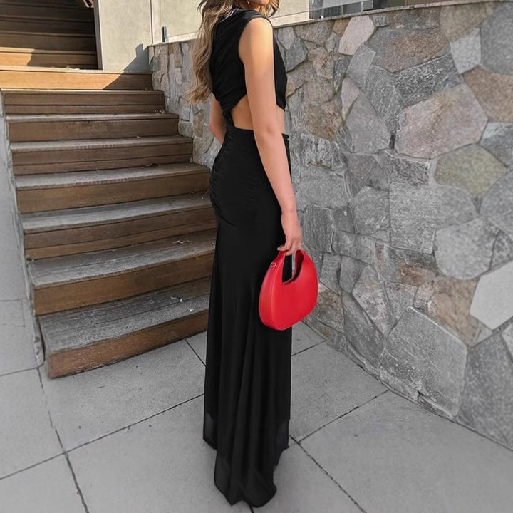 Damer elegant maxiklänning med asymmetrisk skärning och volangdetaljer Mirla-Eva Jonsson