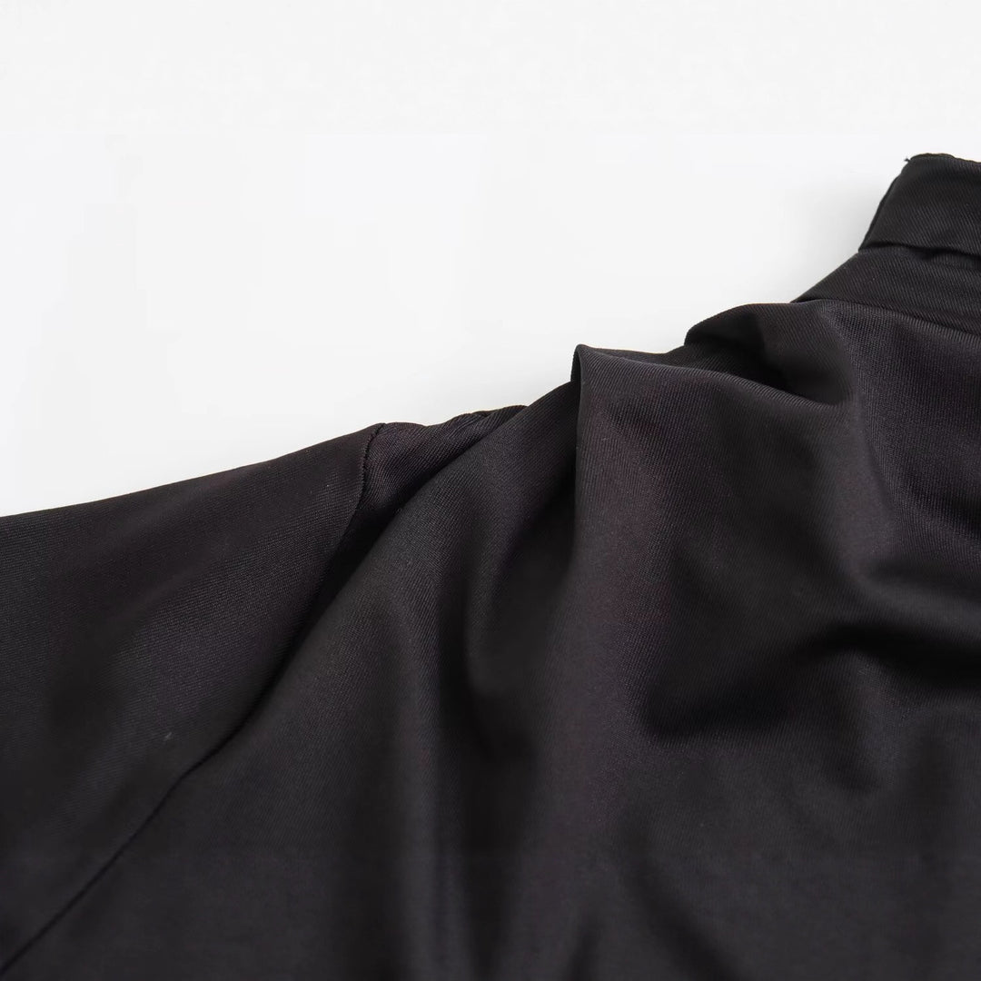 Damer elegant maxiklänning med asymmetrisk u-ringning och draperingar Mirla-Eva Jonsson