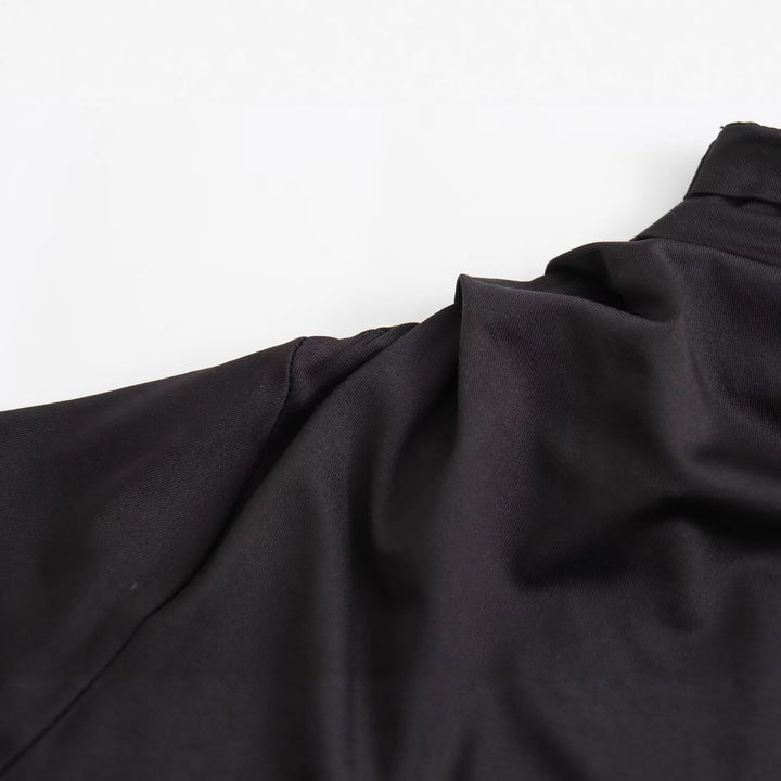 Damer elegant maxiklänning med asymmetrisk u-ringning och draperingar Mirla-Eva Jonsson