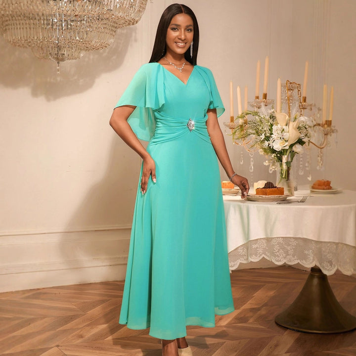 Damer elegant maxiklänning med blomapplikationer Mirla-Eva Jonsson