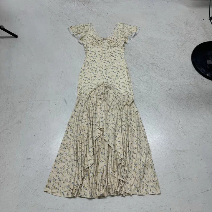 Damer elegant maxiklänning med blommönster och volangdetaljer Mirla-Eva Jonsson