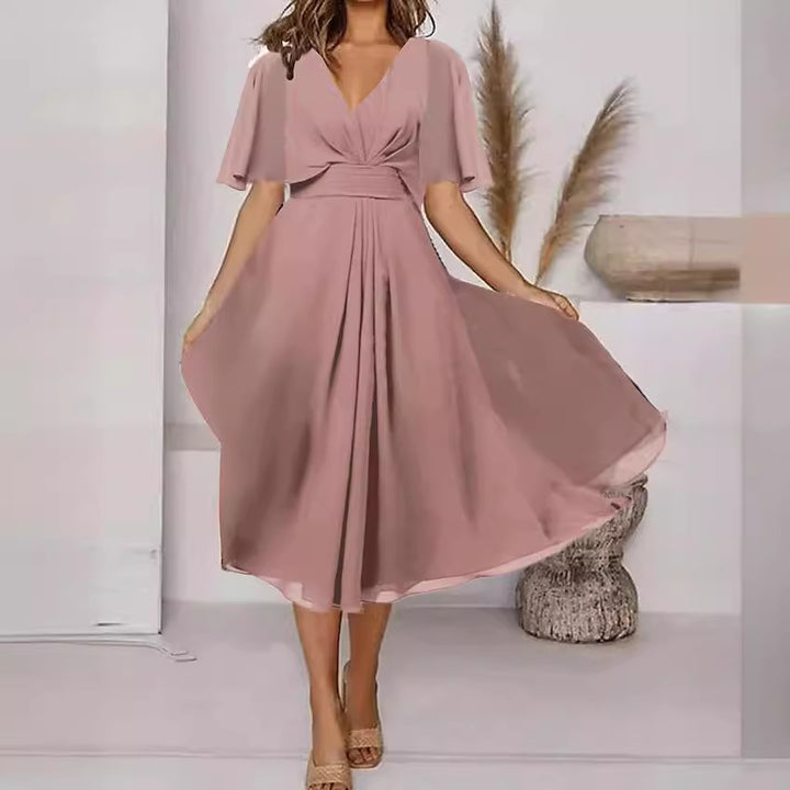 Damer elegant maxiklänning med flödande ärmar och V-ringning Eva Jonsson-Eva Jonsson