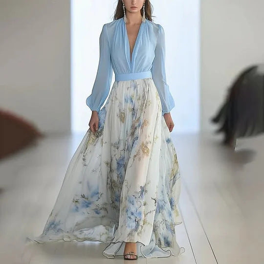 Damer elegant maxiklänning med flödande kjol och djup V-ringning Mirla-Eva Jonsson