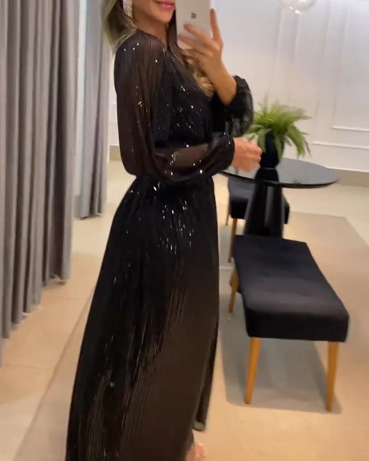 Damer elegant maxiklänning med glittrande detaljer och raffinerad V-ringning Mirla-Eva Jonsson