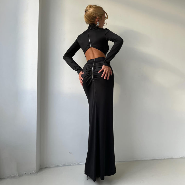 Damer elegant maxiklänning med hög krage och cut-out detaljer Mirla-Eva Jonsson