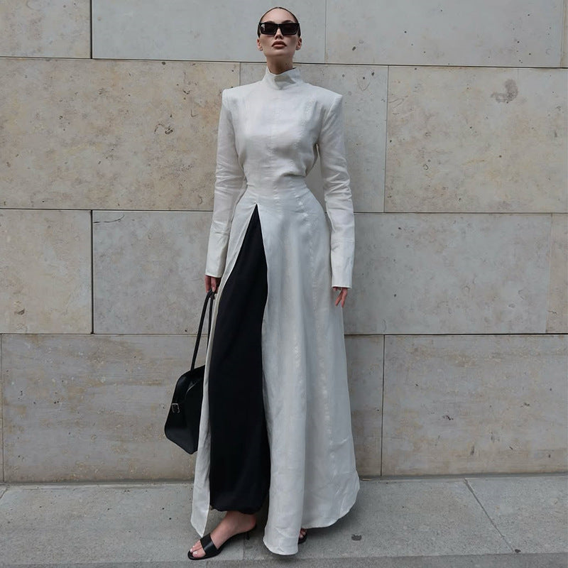 Damer elegant maxiklänning med högstående krage och asymmetrisk färgdesign Mirla-Eva Jonsson