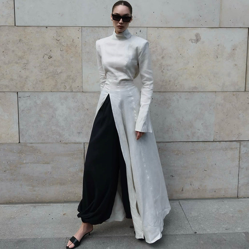 Damer elegant maxiklänning med högstående krage och asymmetrisk färgdesign Mirla-Eva Jonsson