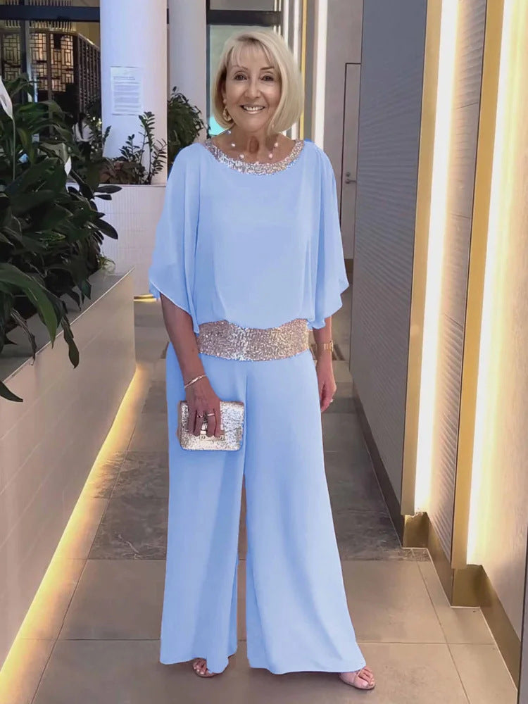 Damer elegant och luftig jumpsuit med glittrande midja Mirla-Eva Jonsson