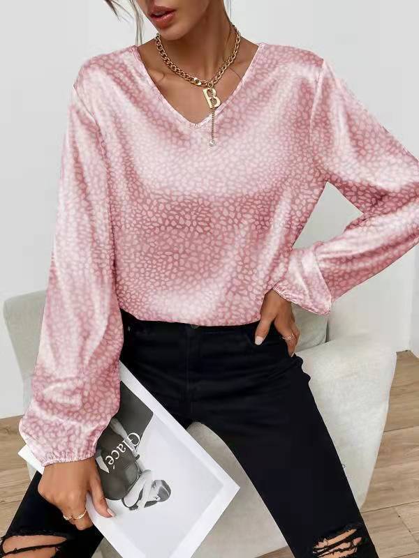Damer elegant och skimrande topp med V-ringning Mirla-Eva Jonsson