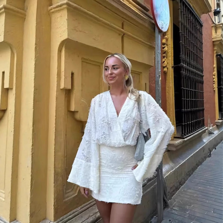 Damer elegant omlotklänning med voluminösa ärmar Mirla-Eva Jonsson