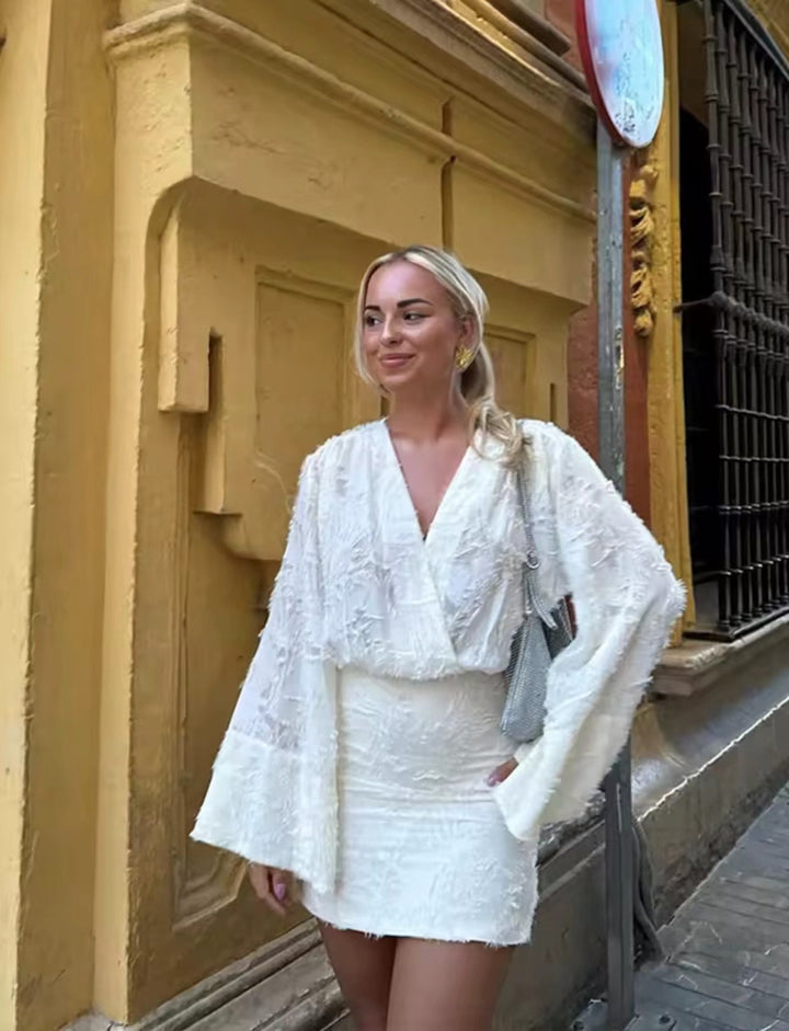 Damer elegant omlotklänning med voluminösa ärmar Mirla-Eva Jonsson