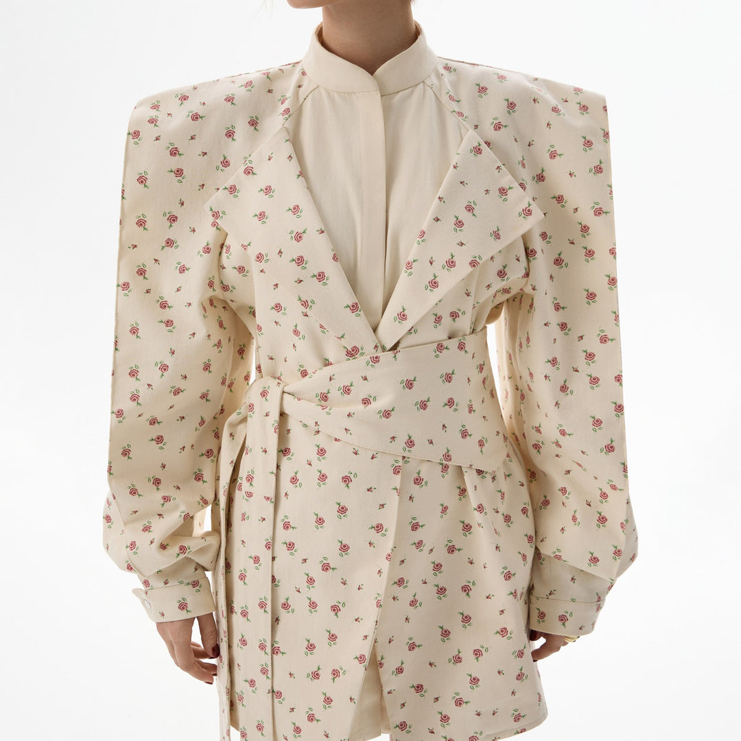 Damer elegant omlotningsklänning med puffärmar och blommönster Mirla-Eva Jonsson