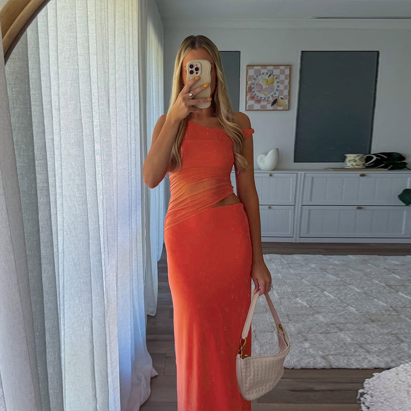 Damer elegant omslagklänning med asymmetrisk skärning och figurnära silhuett Mirla-Eva Jonsson
