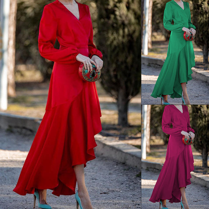 Damer elegant omslagklänning med flödande fåll och voluminösa ärmar Eva Jonsson-Eva Jonsson