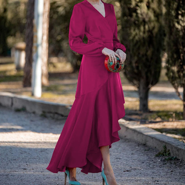 Damer elegant omslagklänning med flödande fåll och voluminösa ärmar Eva Jonsson-Eva Jonsson