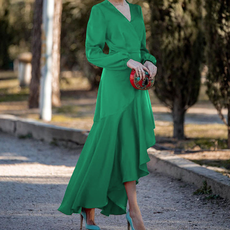 Damer elegant omslagklänning med flödande fåll och voluminösa ärmar Eva Jonsson-Eva Jonsson