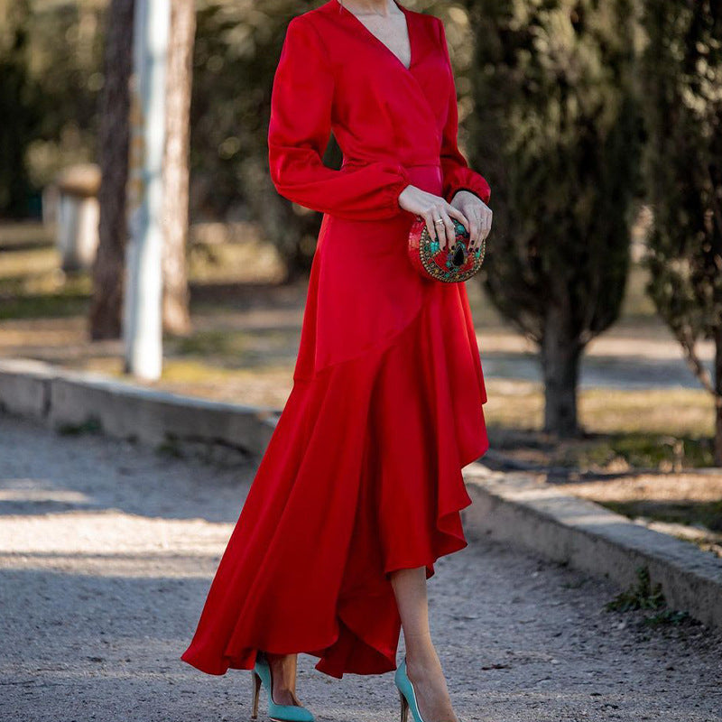Damer elegant omslagklänning med flödande fåll och voluminösa ärmar Eva Jonsson-Eva Jonsson
