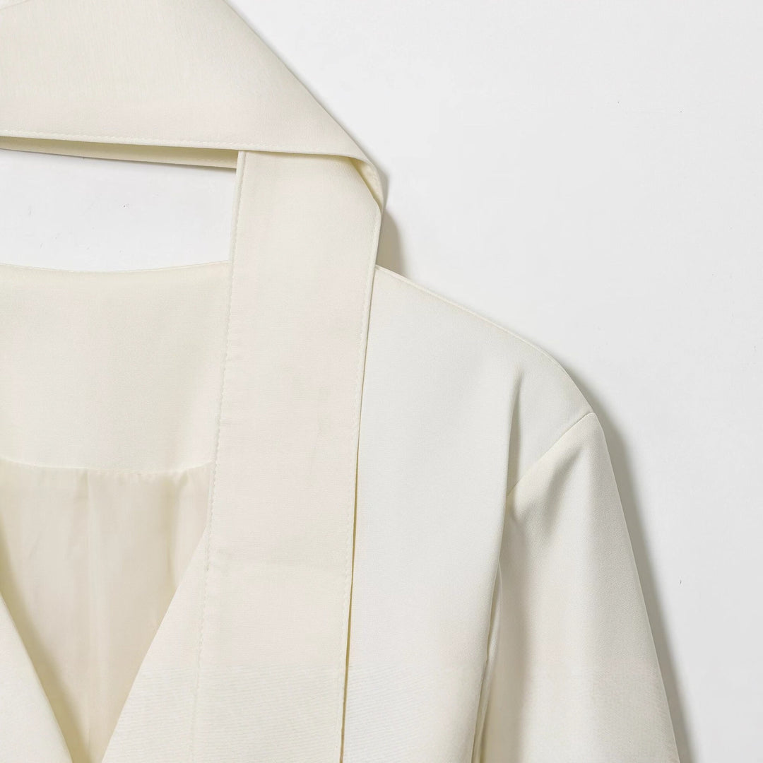 Damer elegant omslagsjacka med moderiktig slipsdesign Mirla-Eva Jonsson