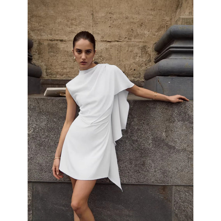 Damer elegant omslagsklänning med asymmetrisk fåll och raffinerad drapering Mirla-Eva Jonsson