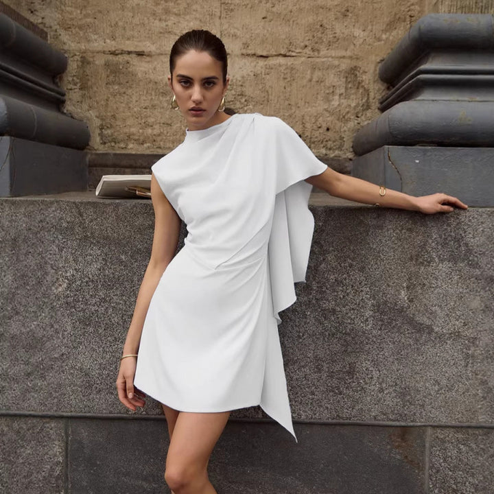 Damer elegant omslagsklänning med asymmetrisk fåll och raffinerad drapering Mirla-Eva Jonsson