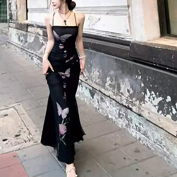 Damer elegant omslagsklänning med blommig fjärilstryck och justerbara spaghettistill.-Eva Jonsson