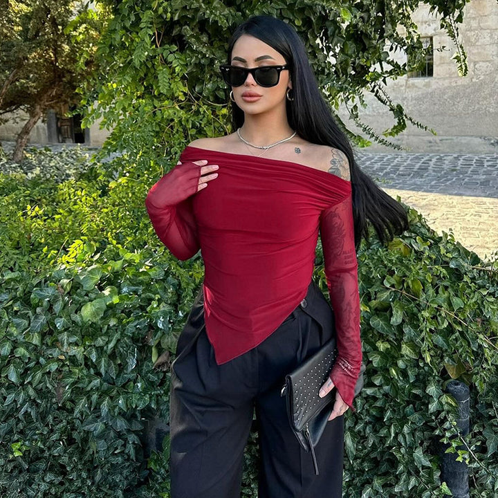 Damer elegant omslagstopp med axel-fri design och transparenta ärmar Mirla-Eva Jonsson