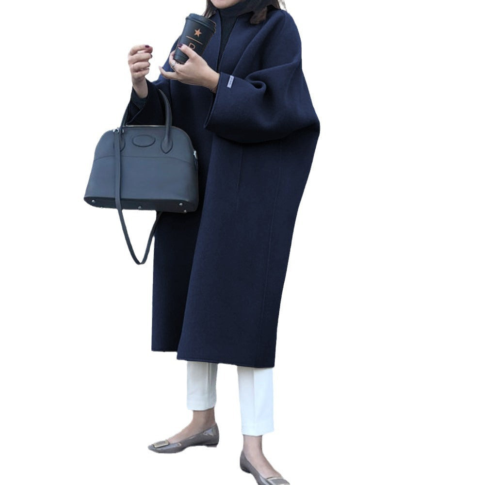 Damer elegant oversized kapp med djup krage och praktiska fickor Mirla-Eva Jonsson