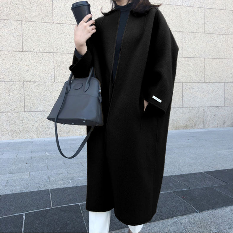 Damer elegant oversized kapp med djup krage och praktiska fickor Mirla-Eva Jonsson
