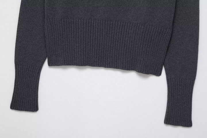 Damer elegant oversized stickad tröja med vid rund halsringning Mirla-Eva Jonsson
