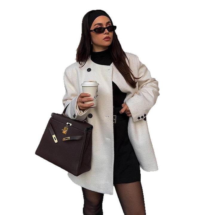 Damer elegant oversized ulljacka med knapppdetaljer Mirla-Eva Jonsson