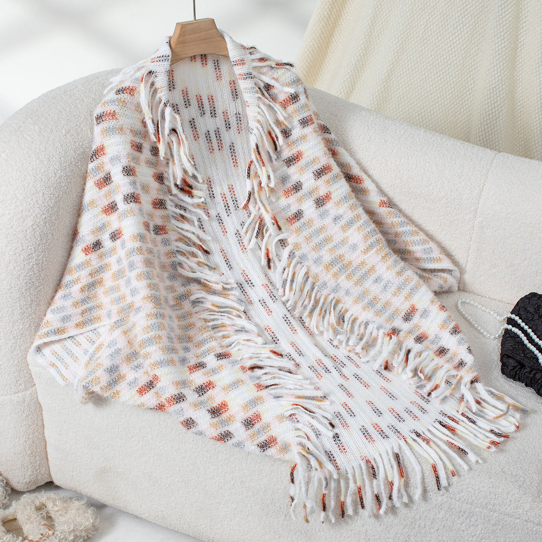Damer elegant poncho med fransiga detaljer och modernt rutmönster Mirla-Eva Jonsson