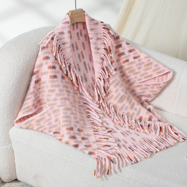 Damer elegant poncho med fransiga detaljer och modernt rutmönster Mirla-Eva Jonsson