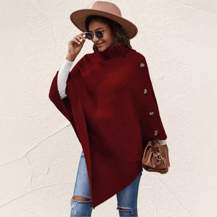 Damer elegant poncho med hög krage och dekorativa knappar Mirla-Eva Jonsson