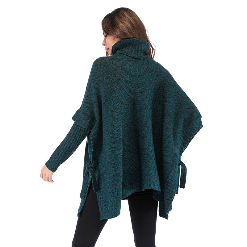 Damer elegant poncho med hög krage och slipad design Mirla-Eva Jonsson