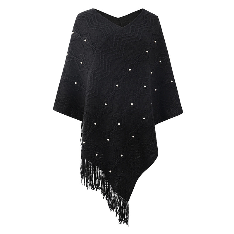 Damer elegant poncho med iögonfallande strukturmönster och dekorativa fransar Mirla-Eva Jonsson