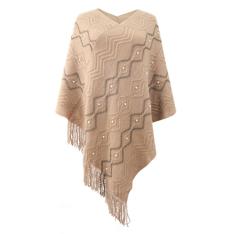 Damer elegant poncho med iögonfallande strukturmönster och dekorativa fransar Mirla-Eva Jonsson
