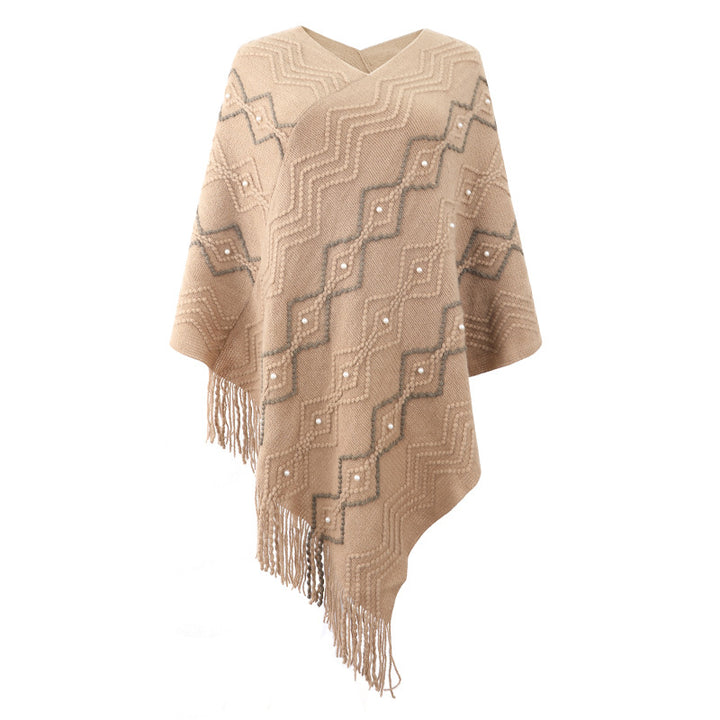 Damer elegant poncho med iögonfallande strukturmönster och dekorativa fransar Mirla-Eva Jonsson